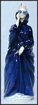 Masque (hand holds mask to face)  #2554A